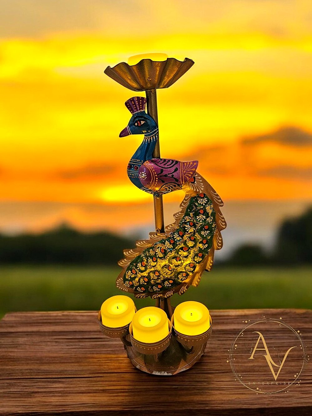 Handcrafted brass peacock tealight holder catching warm evening light